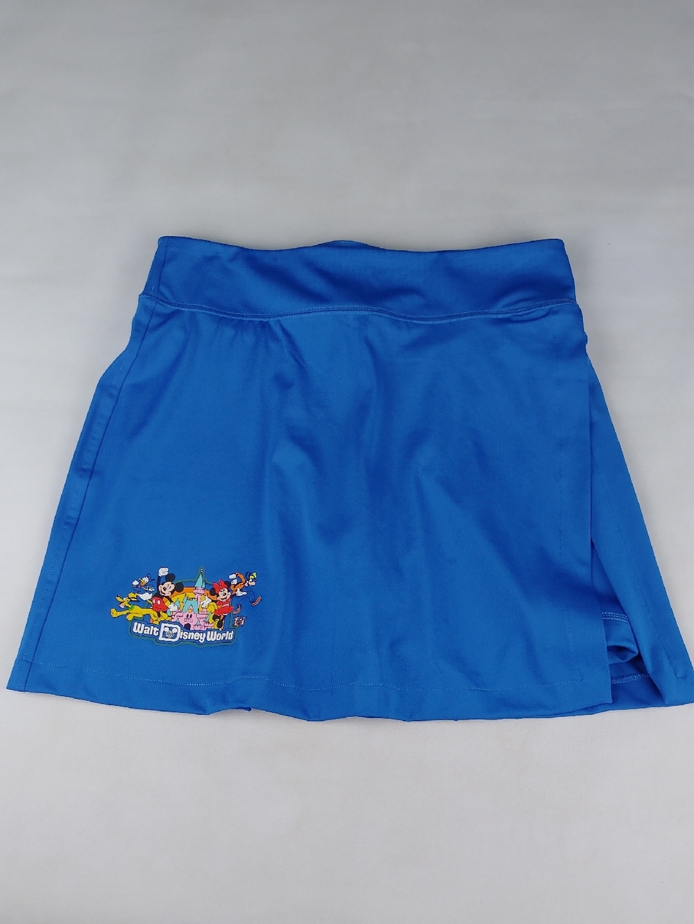 Walt Disney World Blue Performance Skort with Character Graphic.